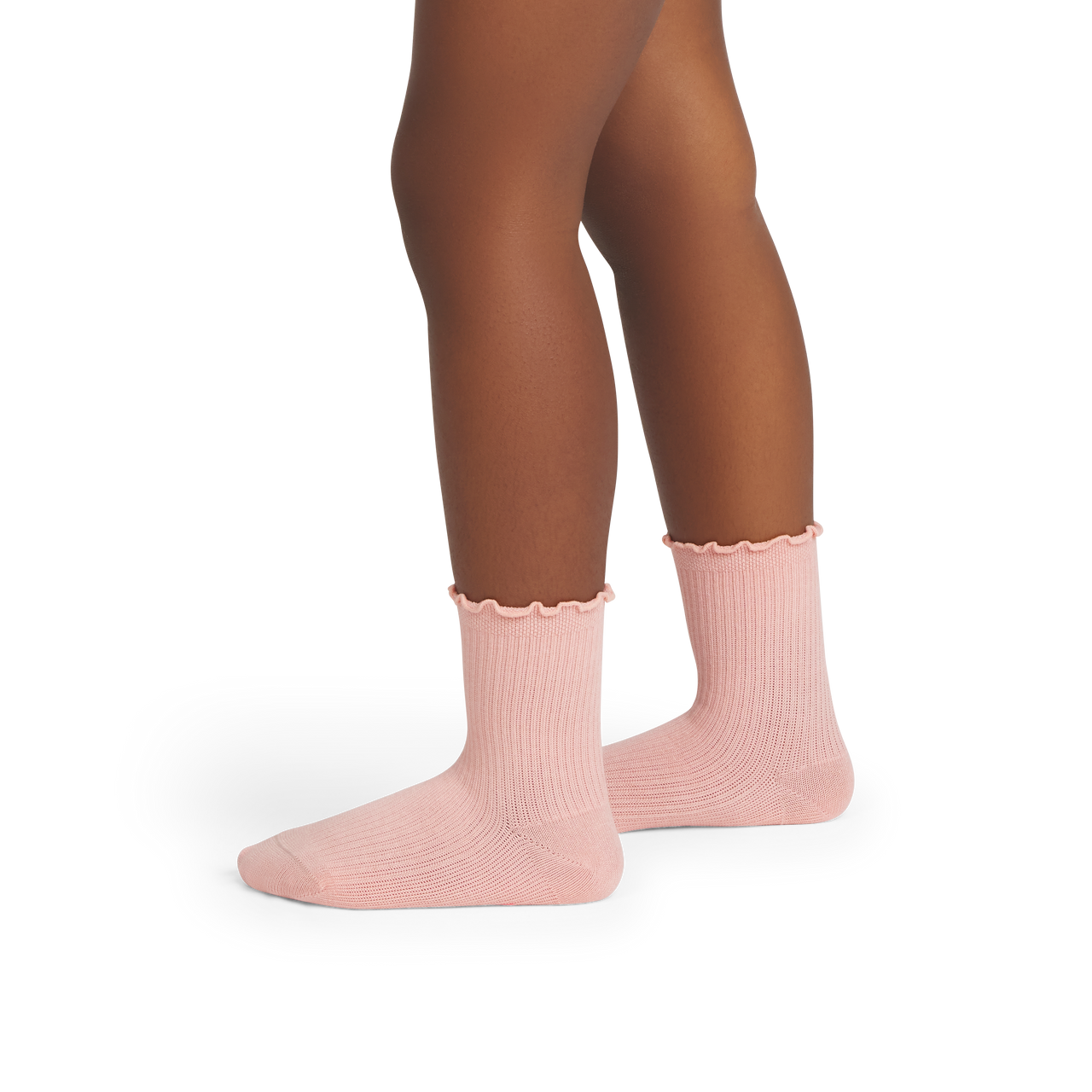 official-bombas::10095-shellpink-junior-unisex-onmodel-2-transparent.png