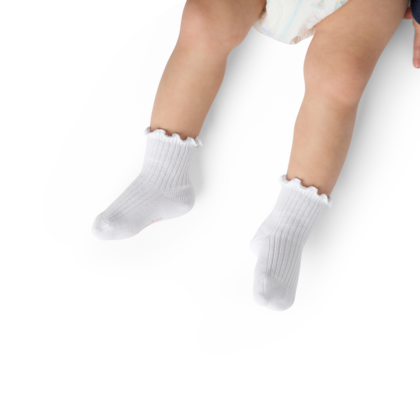 official-bombas::10423-white-baby-6-12-unisex-onmodel-2-transparent-_1_.png