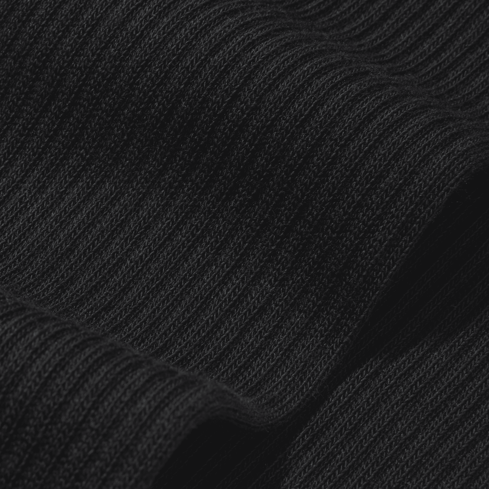 official-bombas::5701-black-adult-detail-4-transparent.png