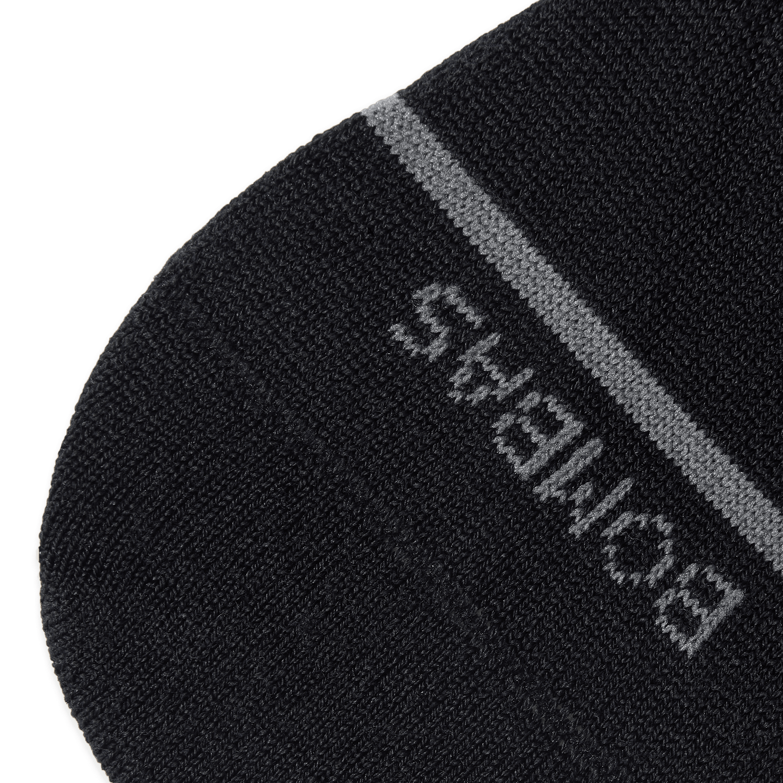 official-bombas::7528-black-adult-detail-4-transparent.png