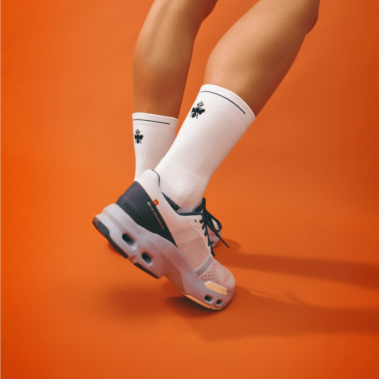 official-bombas::w-running-halfcalf-lifestyle-transparent.png